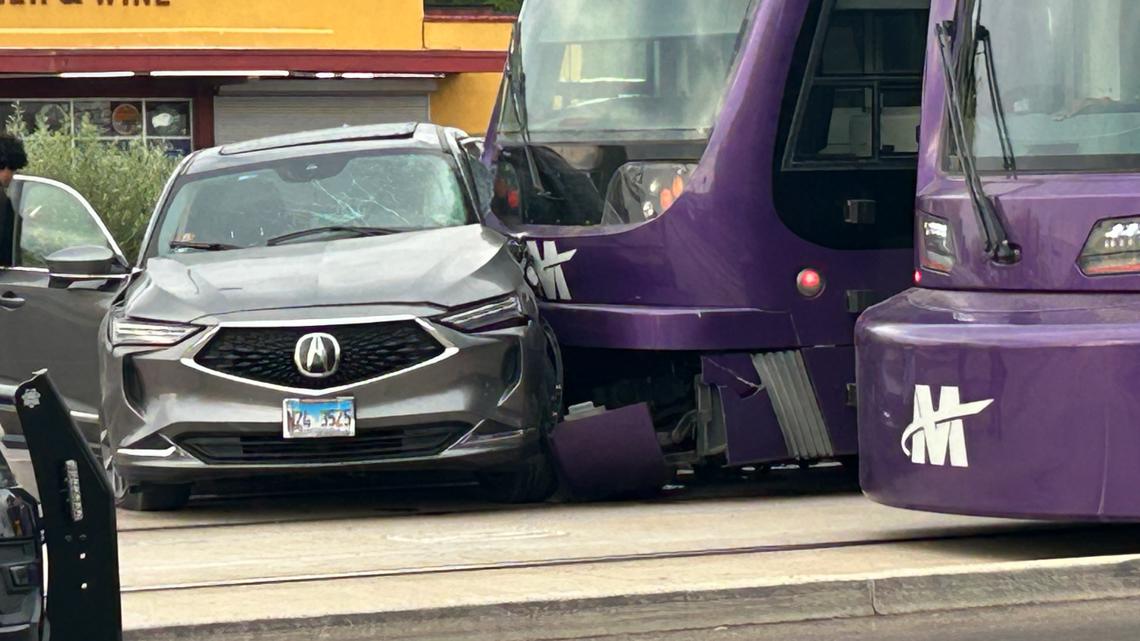 Car pushed 25 feet by light train after trying to do U-turn at red light, Tempe police say